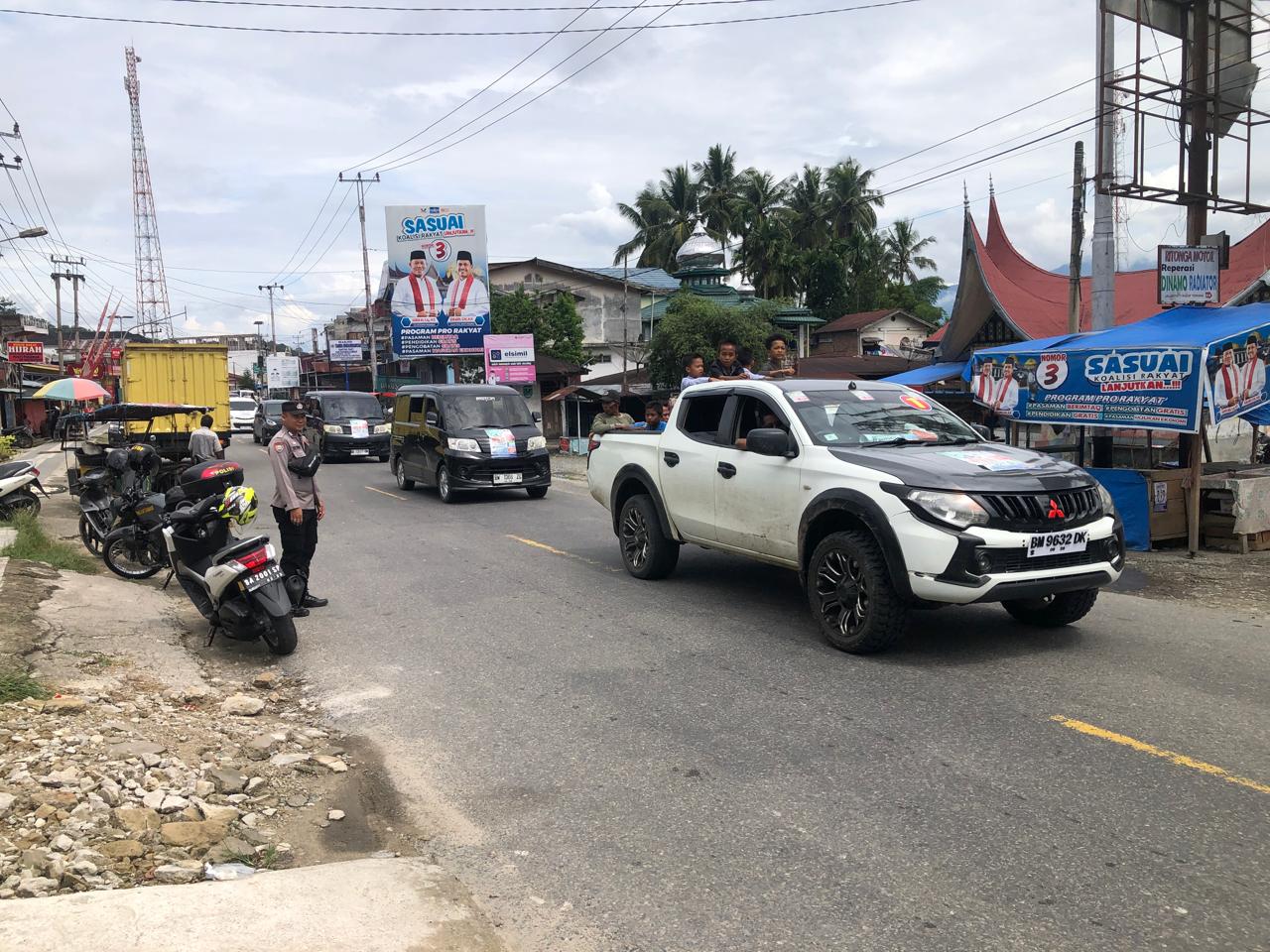 Personil Polsek Panti dalam Pengamanan Keberangkatan Masa Paslon No 1 Bupati dan Wakil Bupati Pasaman WELLY SUHERY, ST dan ANGGIT KURNIAWAN NASUTION, S.Ikom, M.Sc (WA)